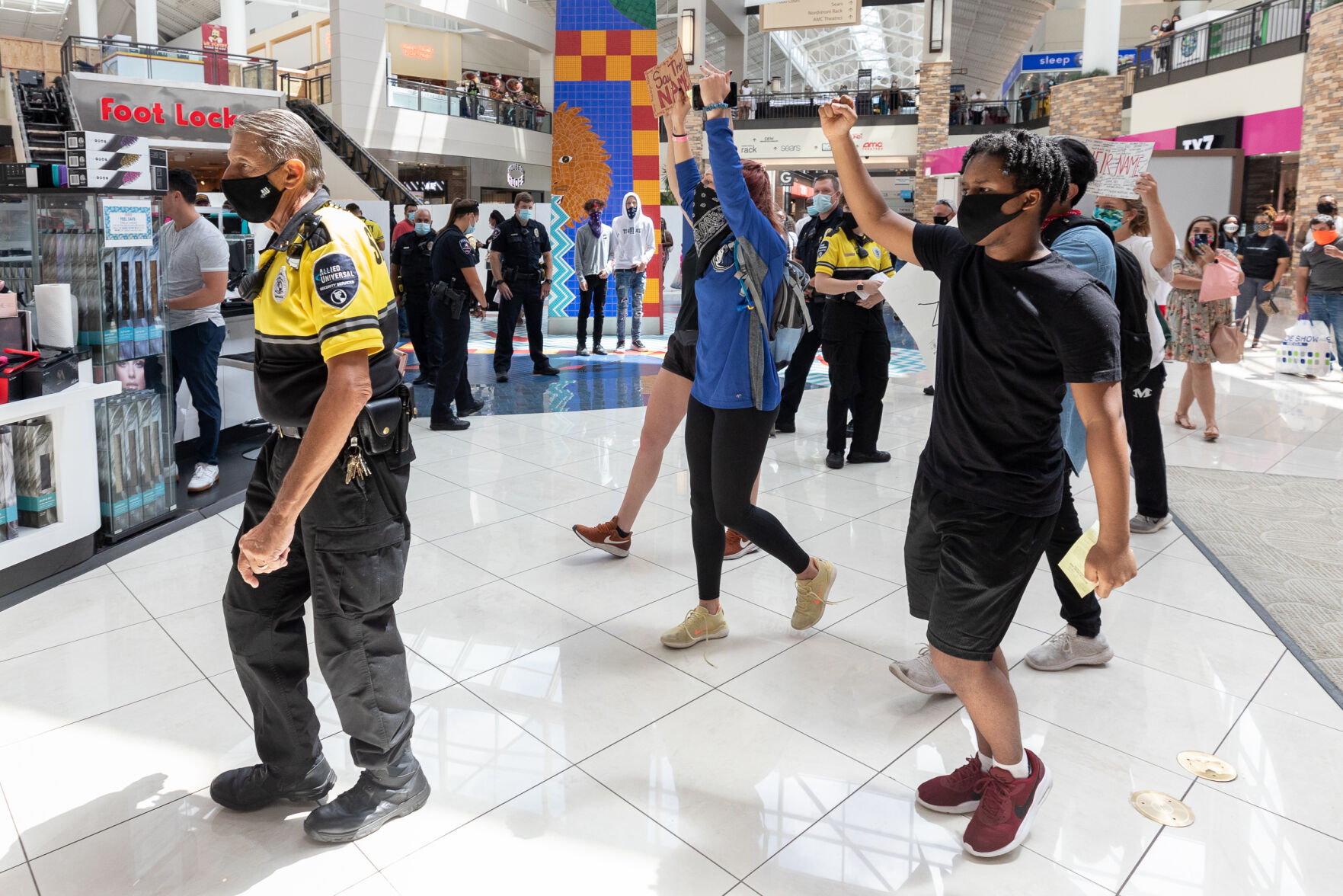 Photos: Protesters kneel for Black Lives Matter movement inside The Parks Mall at Arlington